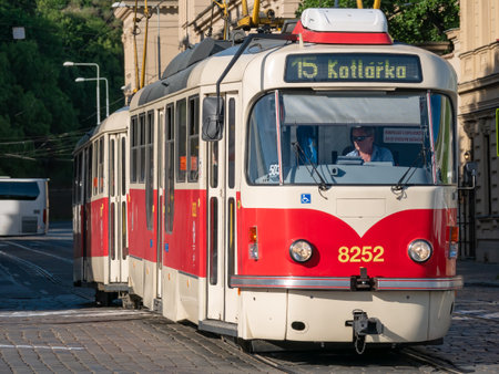 Prague, Czech Republic - June 2022: Red vintage tram public transport on the streets of Pragueの写真素材