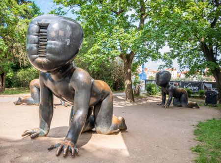 Prague, Czech Republic - June 2022: Famous sculpture Crawling Babies in Kampa Park museum, in Pragueのeditorial素材