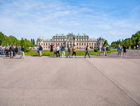 Vienna, Austria - June 2022: Tourists strolling on the alleys of the gardens of Belvedere Palace (Schloss Belvedere)のeditorial素材