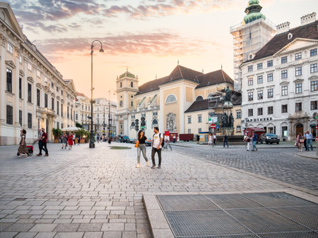 Vienna, Austria - June 2022: Scene from Historisches Zentrum von Wien ( Historic city center in Vienna). Tourists on the cobblestone streets of Viennaのeditorial素材