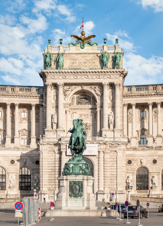 Vienna, Austria - June 2022: View with the facade of The Hofburg baroque palace from Heldenplatz squareのeditorial素材