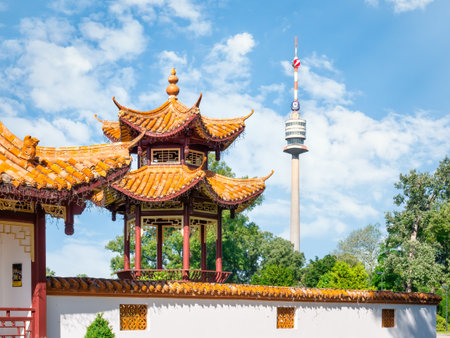 Vienna, Austria - June 2022: View with The Donauturm(Danube Tower) from the China Sichuan Restaurant located in Donau Parkのeditorial素材