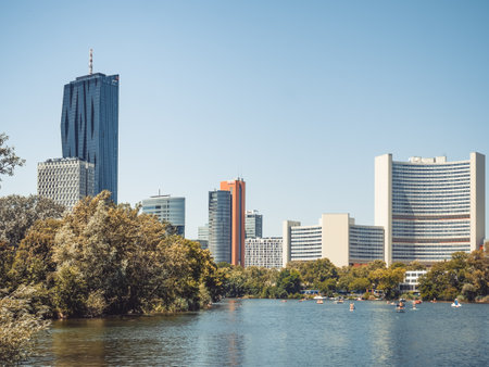 Vienna, Austria - June 2022: View from Kaiserwasser Alte Donau park with the building complex hosting the United Nations Office at Viennaのeditorial素材