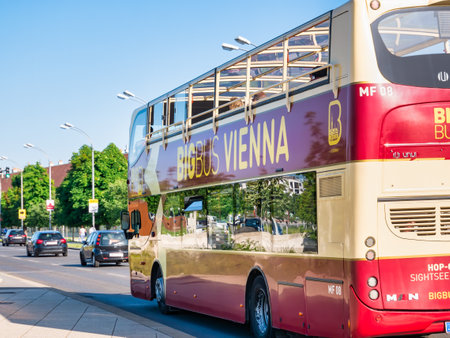Vienna, Austria - June 2022: Big Buss Vienna Hop-On Hop-Off Tours in trafficのeditorial素材