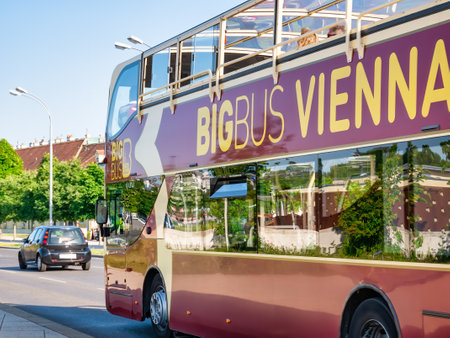 Vienna, Austria - June 2022: Big Buss Vienna Hop-On Hop-Off Tours in trafficのeditorial素材