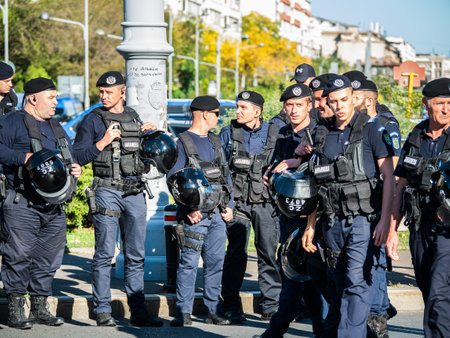 Bucharest, Romania - October 2022: : Police officers and Gendarmerie or military police closely supervising the demonstrators at a protest in Bucharest.のeditorial素材