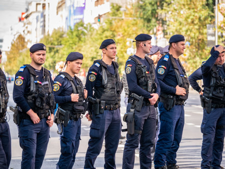 Bucharest, Romania - October 2022: : Police officers and Gendarmerie or military police closely supervising the demonstrators at a protest in Bucharest.のeditorial素材