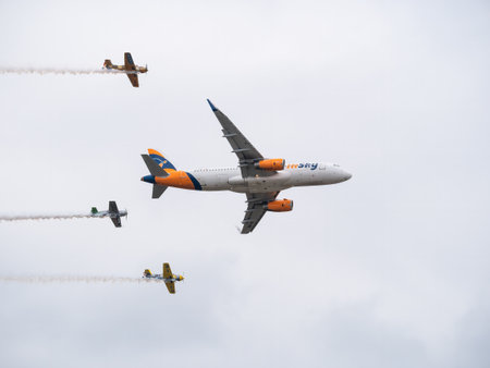 Bucharest, Romania - September 2022:HiSky Airways Airbus A320-200 flying against blue sky. Airplane takes off from Henry Coanda International Airport.のeditorial素材