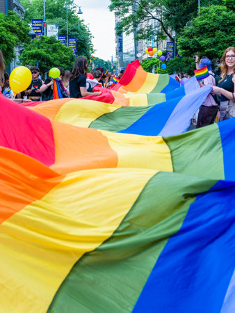 Bucharest, Romania - July 2022: LGBTQ rainbow flag at Pride parade rally in Bucharestのeditorial素材