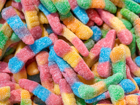Many colorful jelly beans sweets background. Gumdrops candies with sugar crystallized