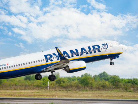 Bucharest, Romania - August 2022: Ryanair Boeing 737 flying against blue sky. Airplane takes off from Henry Coanda International Airport.のeditorial素材