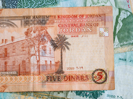 Macro detail picture with 5 Jordanian dinar banknote. JOD is the official currency in The Hashemite Kingdom of Jordanの写真素材