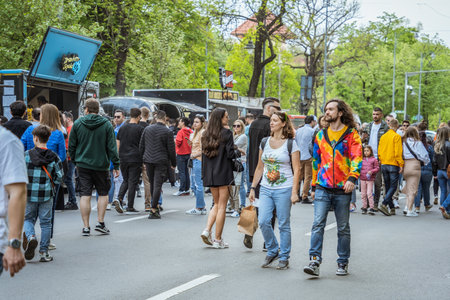 Bucharest, Romania - April 2023: Tourists and locals strolling and walking on Victory street ( Calea Victoriei ). Pedestrian area in the old town of Bucharestのeditorial素材