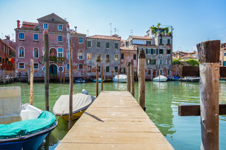 Boatyard with many boats on the water in Venice, Italy.の写真素材