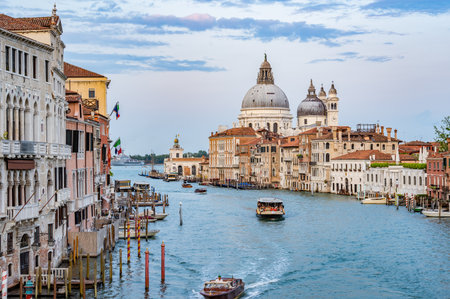 Venice, Italy - May 29 2023: View over the Grand Canal with Basilica di Santa Maria della Salute in Venice.のeditorial素材