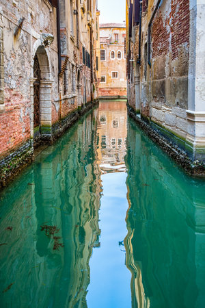 Picturesque Scene from Venice with the narrow water canals.の写真素材