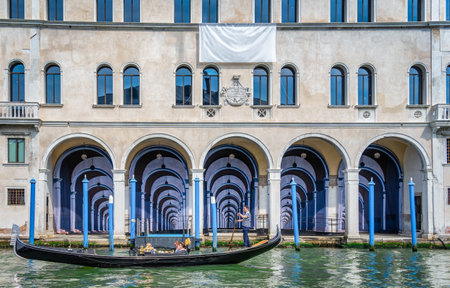 Venice, Italy - May 30 2023: Traditional gondola ride on the Grand Canal.Tourists in Venice.のeditorial素材