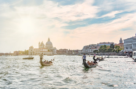Venice, Italy - May 30 2023: Traditional gondola ride on the Grand Canal.Tourists in Venice.のeditorial素材