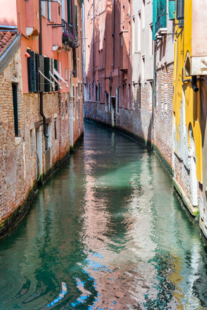 Picturesque Scene from Venice with the narrow water canals.の写真素材