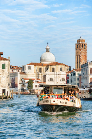 Venice, Italy - May 31 2023: Crowded public venetian public waterbus called vaporetto (ACTV) on Grand Canal in Veniceのeditorial素材