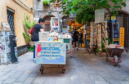Venice, Italy - May 31 2023: The entrance to the famous bookstore Libreria Acqua Alta in Venice.のeditorial素材