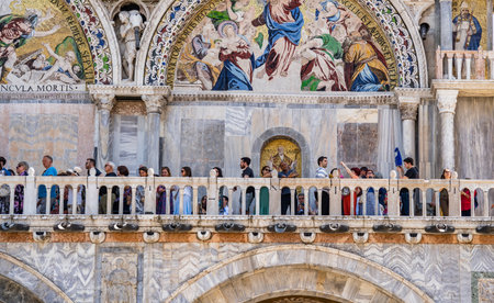 Venice, Italy - May 31 2023: Crowds of tourists on the balcony of San Marco Basilica in Venice.のeditorial素材