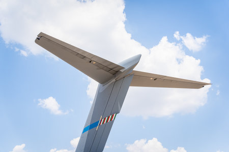 Close up detail with the stabilizers, ailerons, rudders and elevators of a planeの写真素材