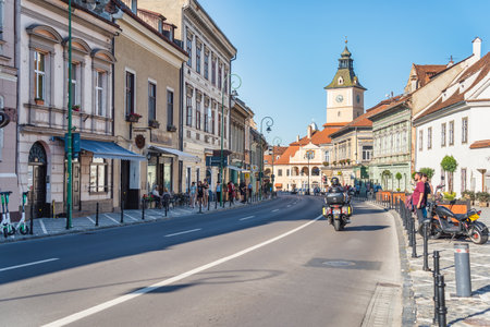Brasov, Romania - September 02 2023: Brasov city hall clock tower located in the old town Council Square.のeditorial素材