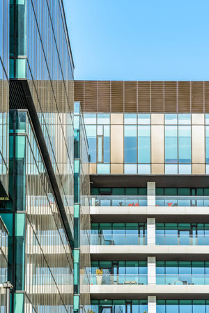 Detail of a modern office and apartment building. Glass building office in the center of Bucharest.