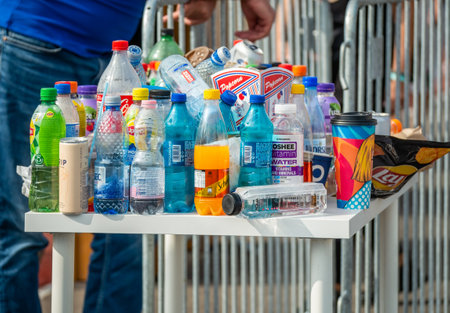 Bucharest, Romania - September 16 2023: Table filled with many plastic bottles . Recycling and plastic pollution concept.のeditorial素材