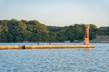 Red lighthouse at Katsuura Bay on the Pacific coast in Nachikatsuura, Japan.の写真素材