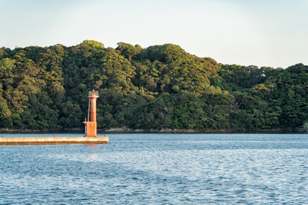 Red lighthouse at Katsuura Bay on the Pacific coast in Nachikatsuura, Japan.の写真素材