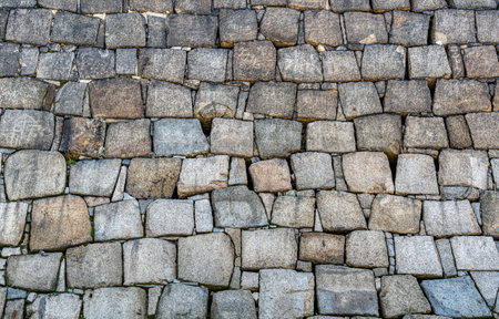 Traditional japanese stone wall moat at the base of Osaka Castle. Texture background.の写真素材