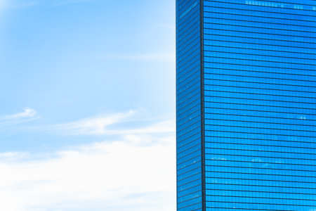 Detail of a modern office and apartment building. Glass building office in the center of Osaka, Japanの写真素材