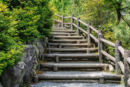 Wooden stairs that leads to a mountain top in Arashiyama, Kyoto.の写真素材