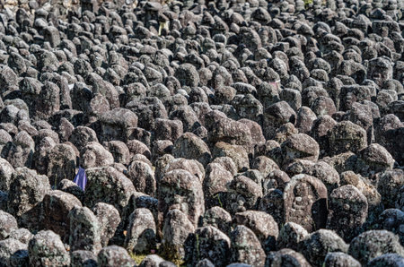 Kyoto, Japan - 05.07.2024: Carved stones memorial statues at Adashino Nenbutsuji Temple, in Arashiyamaの写真素材