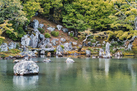 Beautiful scenic Japanese garden with a large pond. Sogenchi Garden on the grounds of Tenryu-ji Temple located in Arashiyama, Kyoto.の写真素材