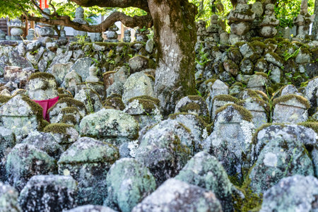 Kyoto, Japan - 05.07.2024: Carved stones memorial statues at Adashino Nenbutsuji Temple, in Arashiyamaの写真素材