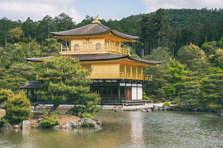 The impressive building structure of Rokuon-ji Kinkakuji (Golden Pavilion) Zen temple overlooking a...