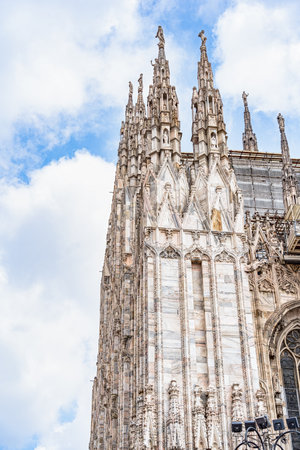 Architectural gothic detail of the iconic Milan Cathedral or Duomo di Milano, the main attraction in the city of Milan.の写真素材