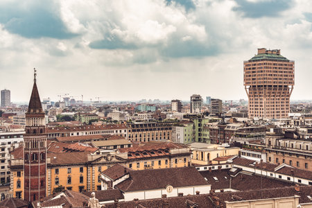 View from the rooftop of the Milan Cathedral (Duomo di Milano), one of the most famous Gothic cathedrals in the world, overlooking the city of Milan, Italyの写真素材