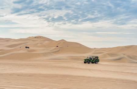 Ica, Peru - March 12, 2025: A buggy car on the sand dunes in the desert of Ica in Huacachinaの写真素材