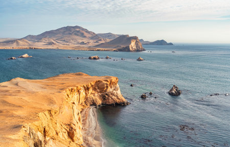 Dramatic landscape with the rocky coastline of the Pacific ocean in Paracas National Reserve, Peru.の写真素材