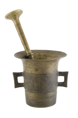 Old mortar and pestle isolated over white with の写真素材