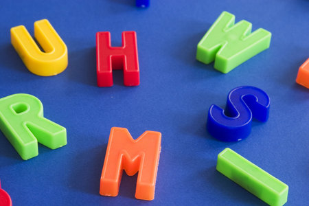 plastic letters on blue backgroundの写真素材