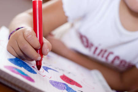 little girl drawingの写真素材