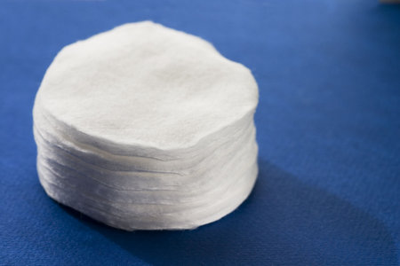 cotton disks on blue backgroundの写真素材