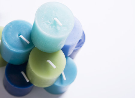 bunch of candles in blue tonesの写真素材