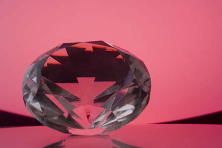 glass stone on red abstract backgroundの写真素材