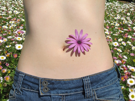 belly with flowersの写真素材